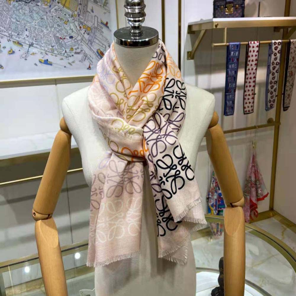 Close-up of Loewe Anagram detail on white wool and cashmere scarf