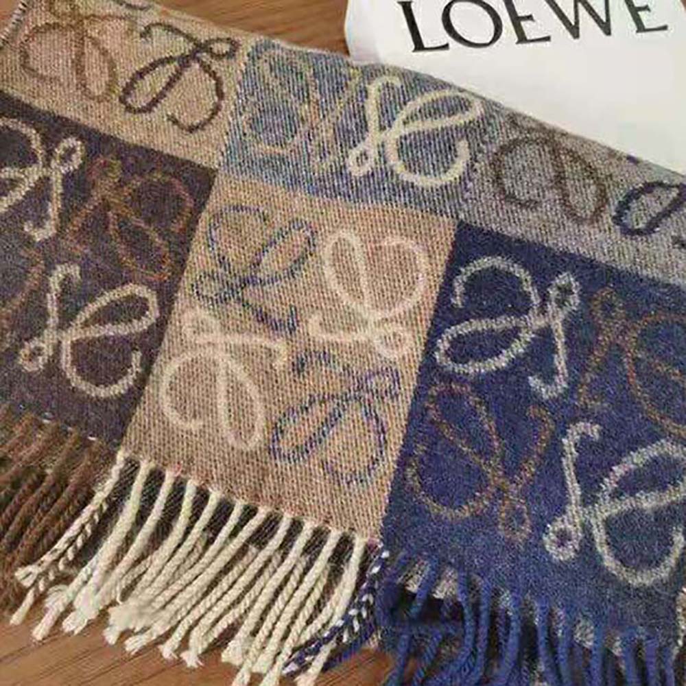 Styled drape showing texture of Loewe Women Anagram Scarf in navy