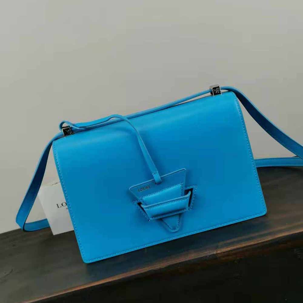Close-up of gold hardware on Loewe Women Barcelona Bag blue leather