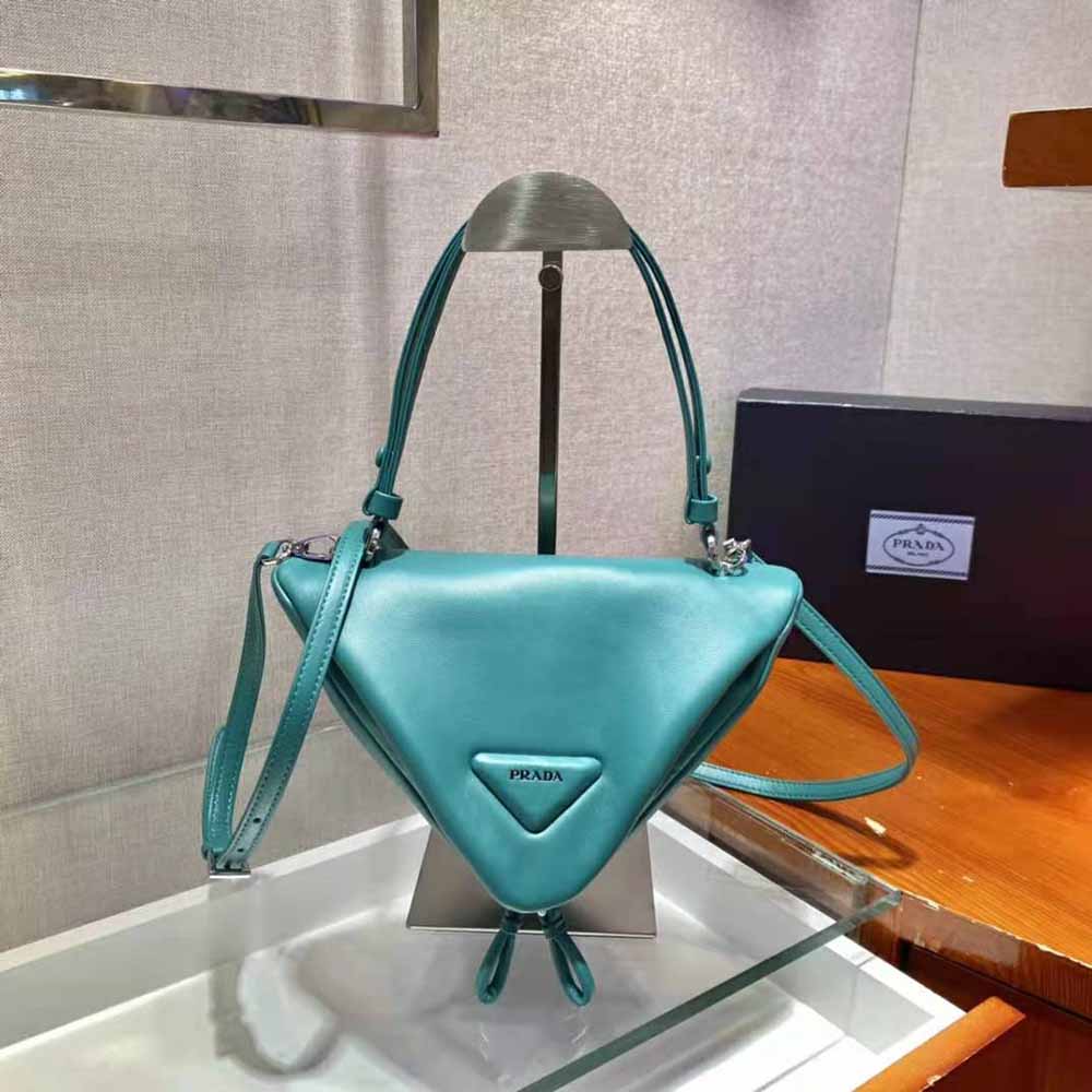 Side angle showing silhouette and magnetic closure of Prada Women Padded Nappa Leather Handbag-Lime