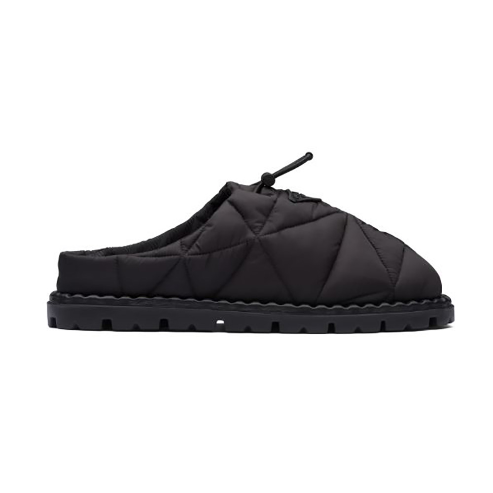 Side view of Prada Women Padded Nylon Slippers in black showing silhouette