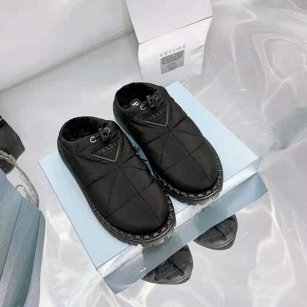 Top down view highlighting cushioned toe area of Prada Women Padded Nylon Slippers