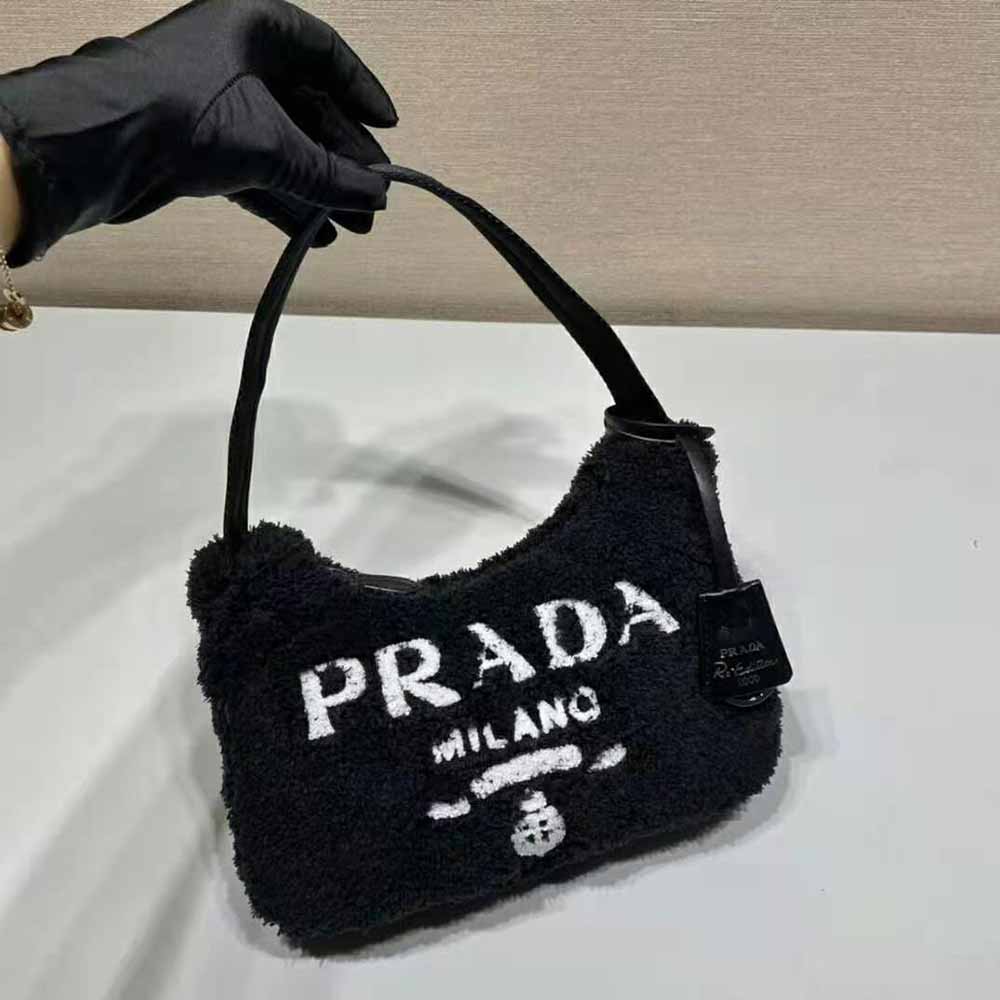 Side angle showing terry fabric texture on Prada Women Re-Edition 2000 Terry Mini-Bag-Black