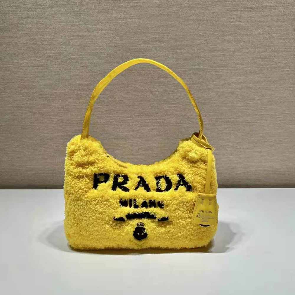 Side angle showing zipper closure of Prada Women Re-Edition 2000 Terry Mini-Bag-Yellow