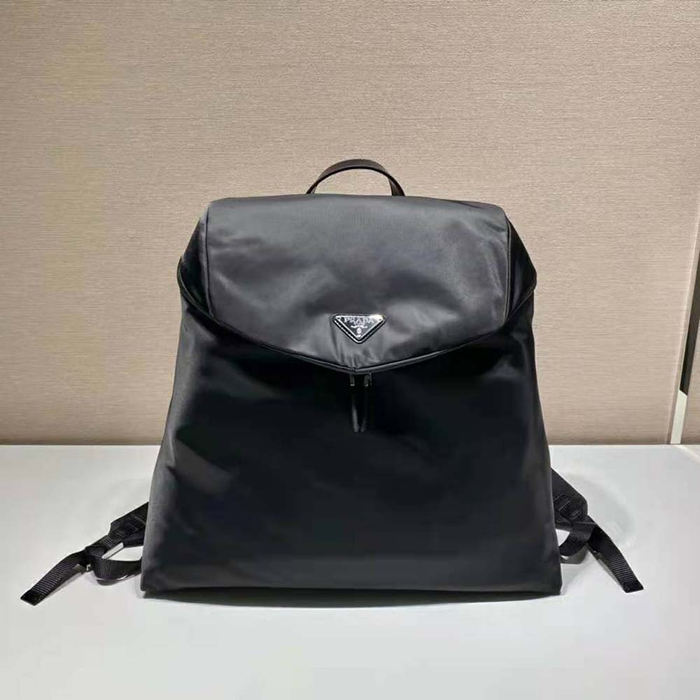 Close-up of silver hardware and logo on Prada Women Re-Nylon and Leather Backpack
