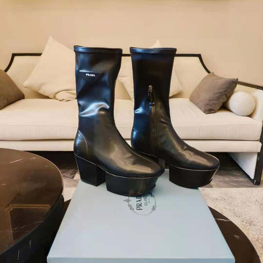 Close-up on zip and metal hardware of Prada Women Technical Nappa Boots