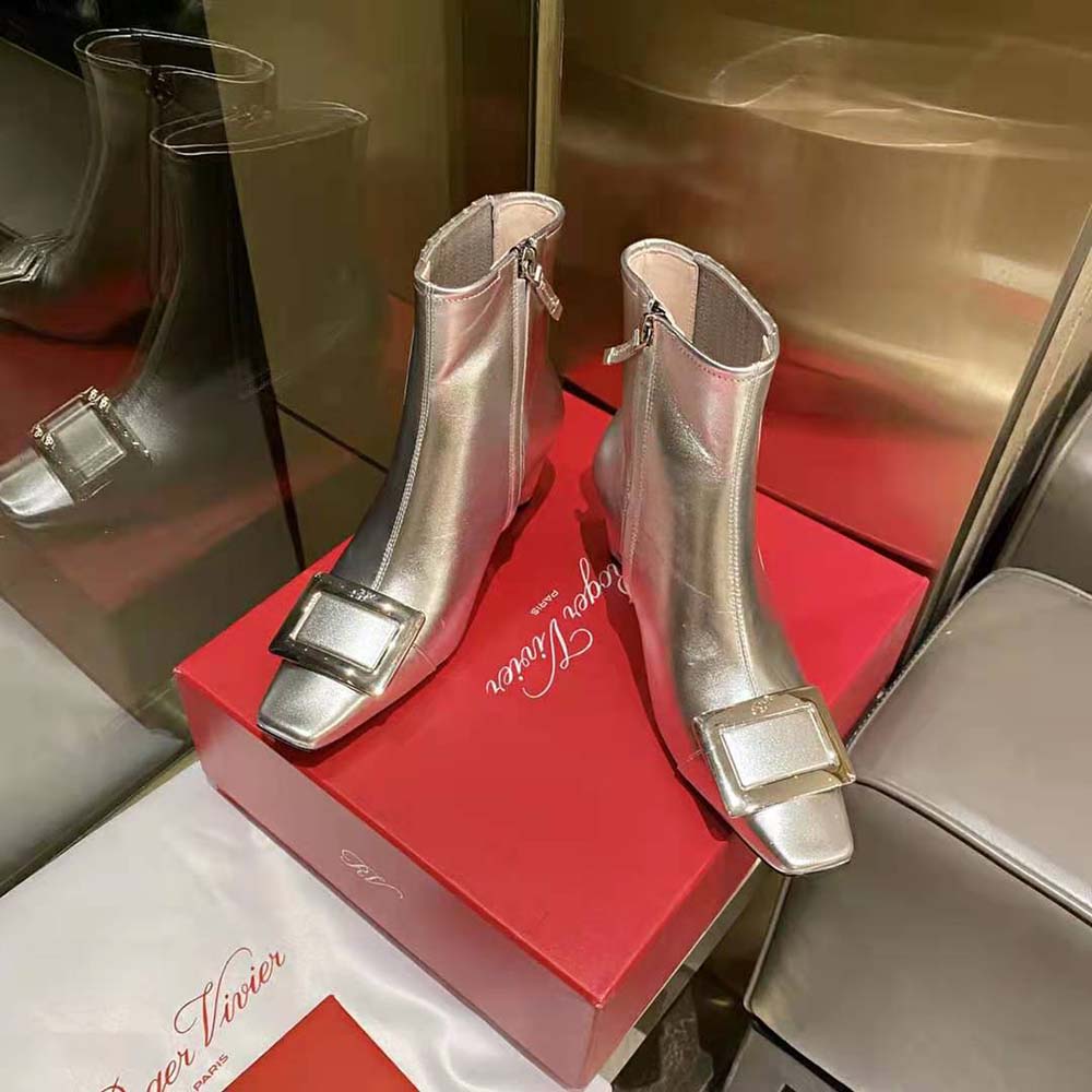 Close-up of signature metal buckle on Roger Vivier Belle Vivier Chelsea Booties