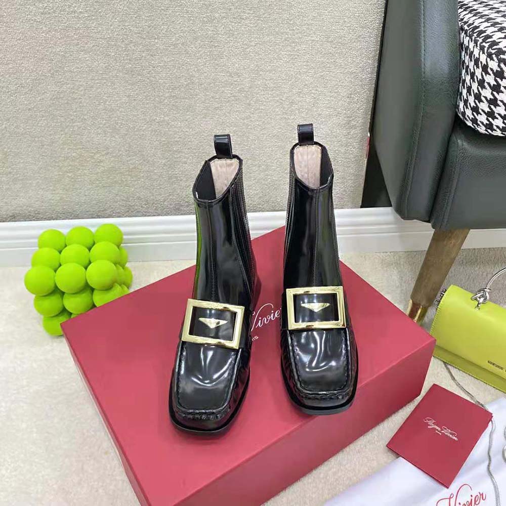Top-down view showing elastic panels on Roger Vivier patent leather booties