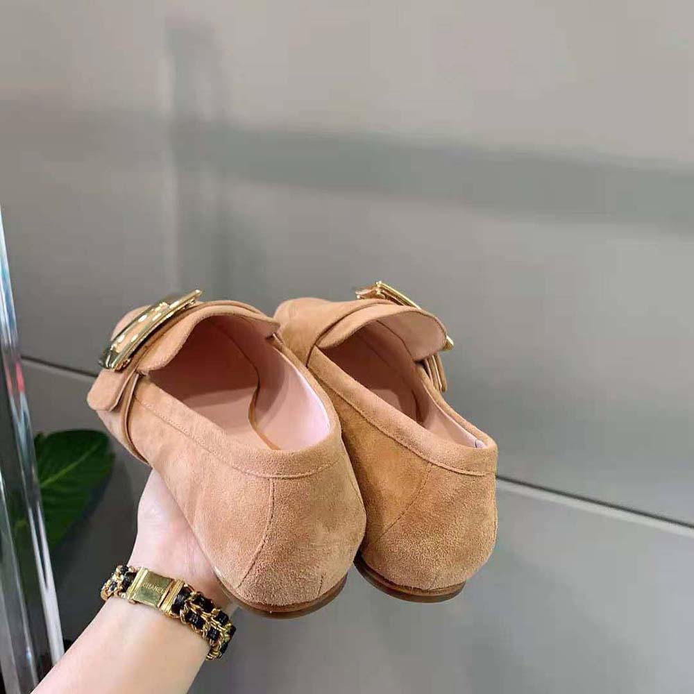 Top angle showing plush suede and signature buckle of Roger Vivier loafers