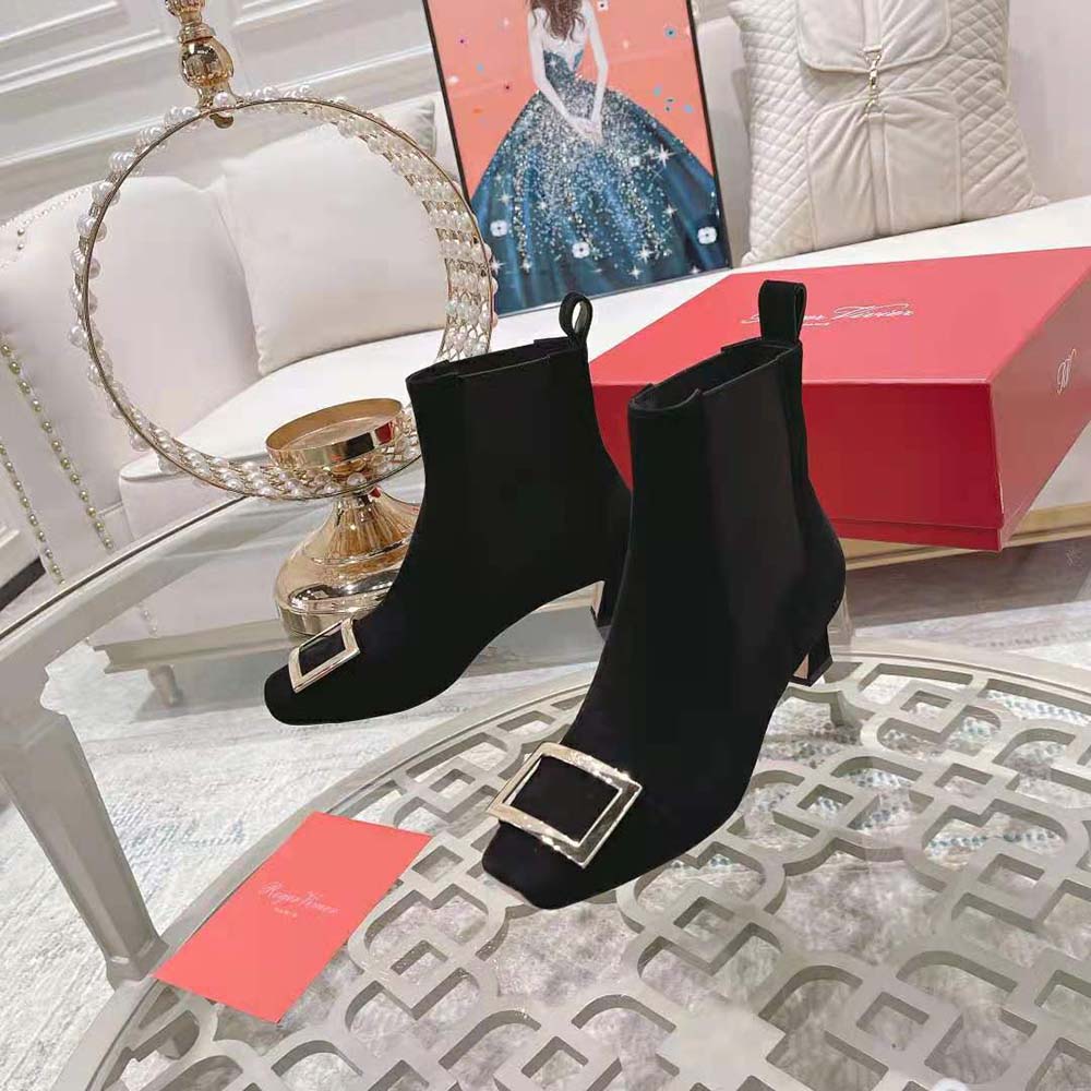 Close-up of metal buckle detail on Roger Vivier Women Trompette Chelsea Booties