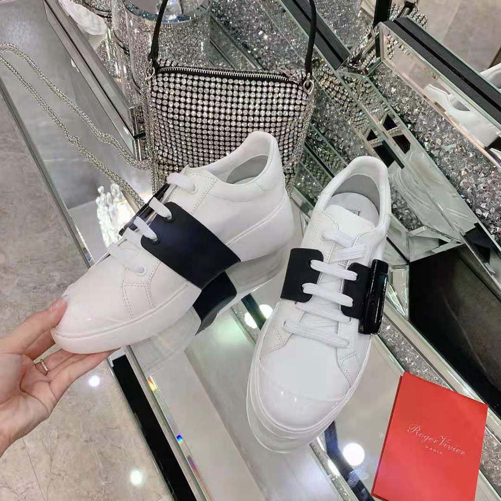 Top-down angle highlighting soft leather texture on Roger Vivier sneakers