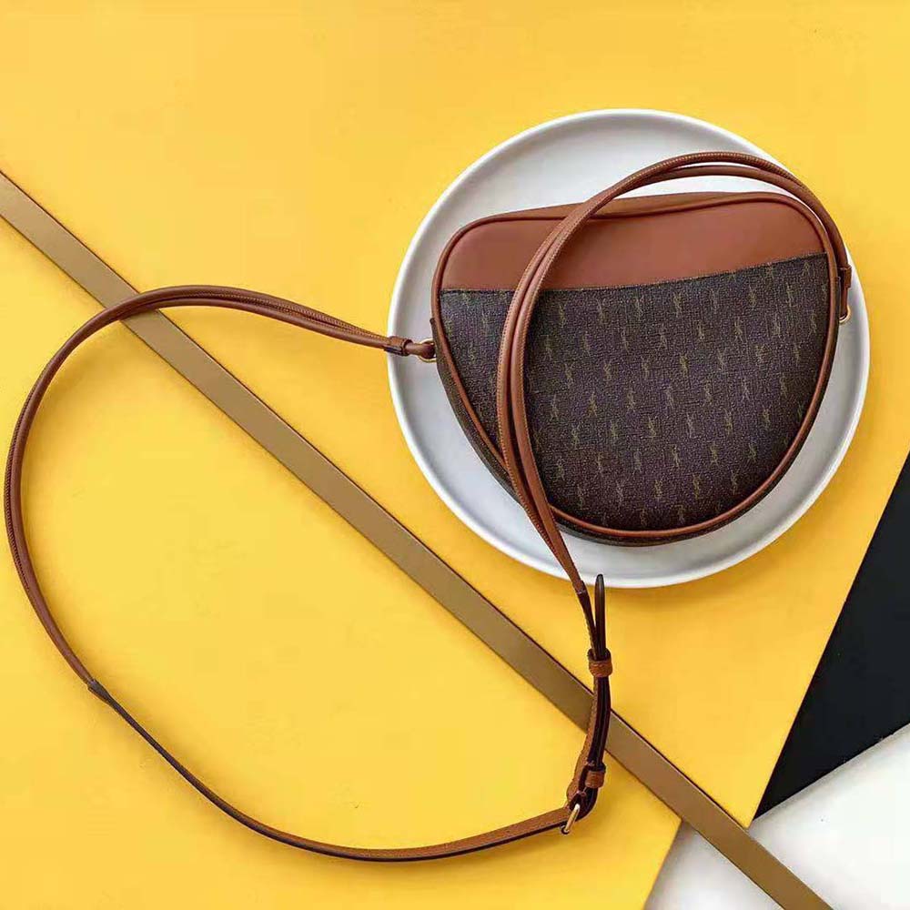 Side angle showing smooth leather trim on Saint Laurent Le Monogramme Coeur Bag