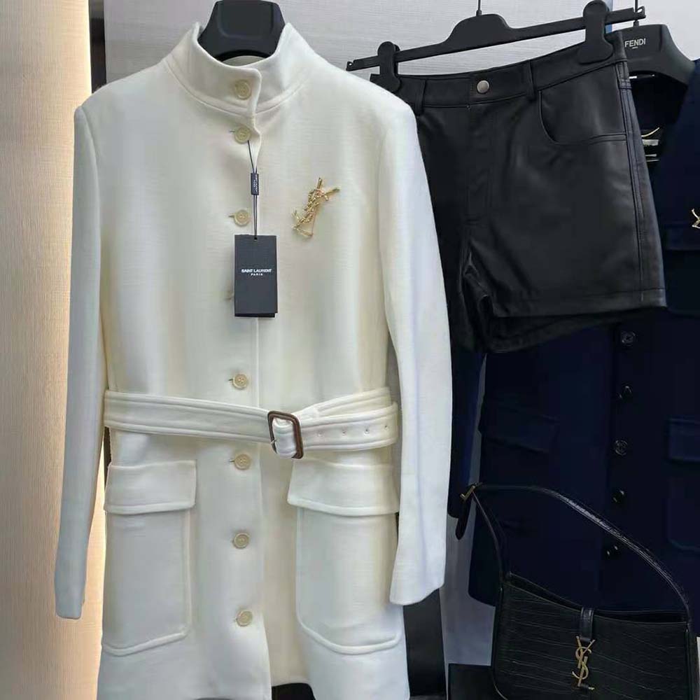 Close-up of wool jersey fabric and YSL hardware on the jacket