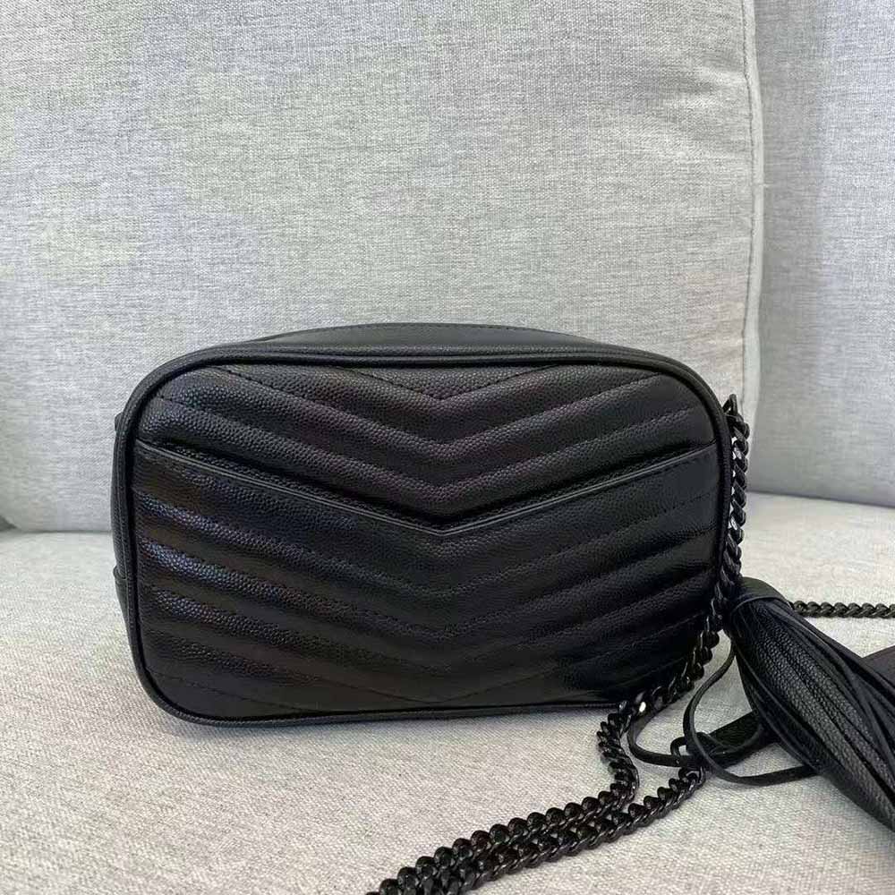 Detail of matte black YSL logo hardware on Lou Mini Bag