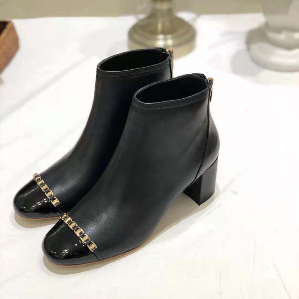 Front angle showing lace-up and silhouette of Vara Chain Bootie