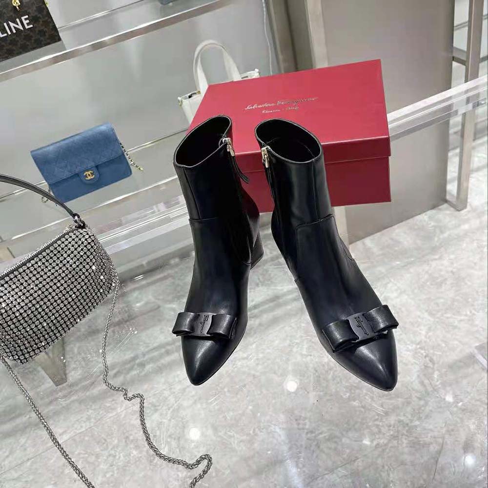 Close-up of gold Gancini hardware on Salvatore Ferragamo Women Viva Bootie