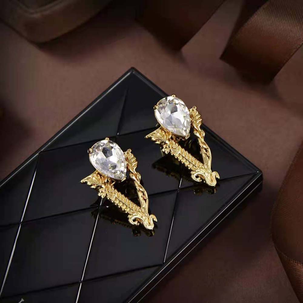 Side angle showing push-back closure on Versace Women Virtus Stud Earrings
