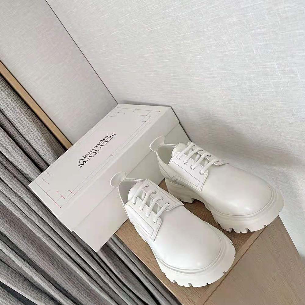 Close-up of lace-up detail on Alexander Mcqueen Women Wander Lace-Up-White