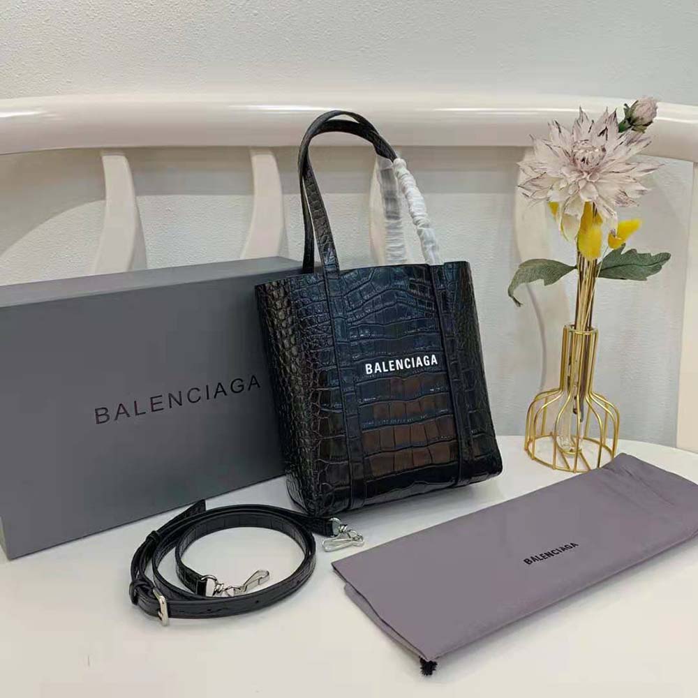 Close-up of crocodile embossing and silver hardware on Balenciaga tote