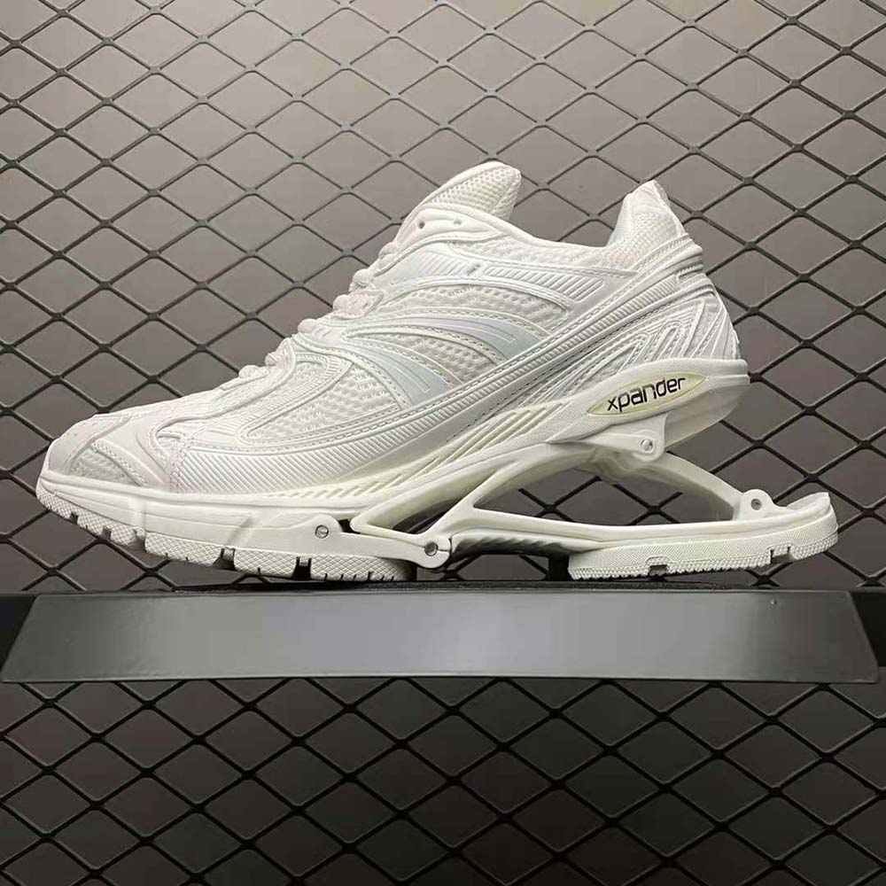 Close-up detail of embossed logo hardware on Balenciaga Women X-Pander Sneaker