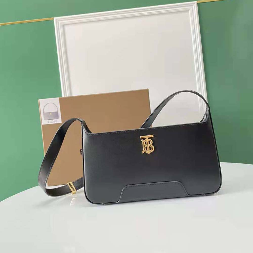 Close-up of Burberry Women Leather TB Shoulder Bag-Black textured leather detail