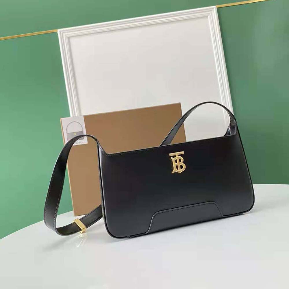 Side angle of Burberry Women Leather TB Shoulder Bag-Black with shoulder strap