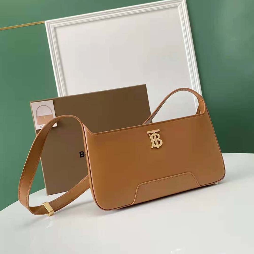 Side profile of Burberry Women Leather TB Shoulder Bag-Brown with strap