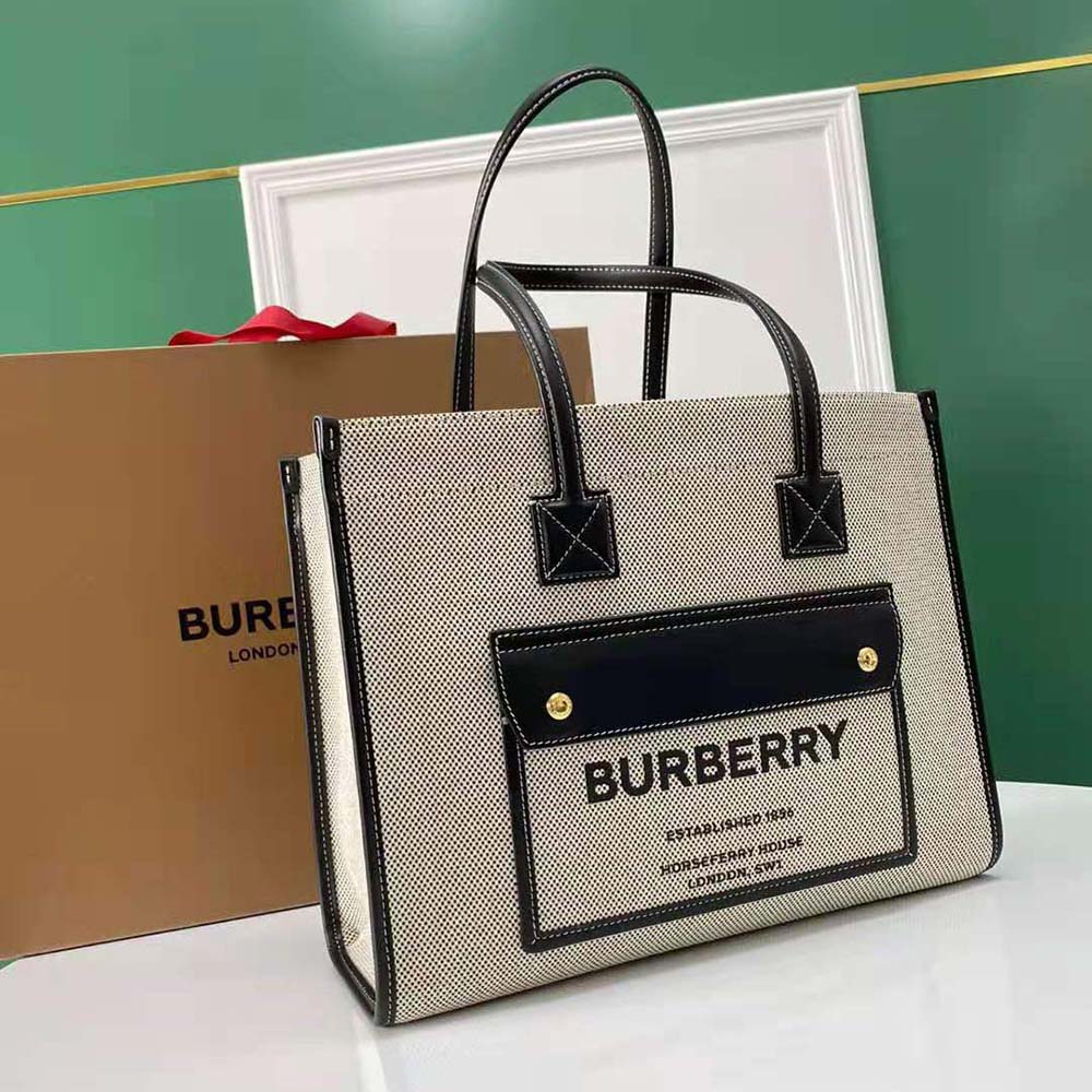Side angle showing structure of Burberry Women Medium Two-tone Freya Tote