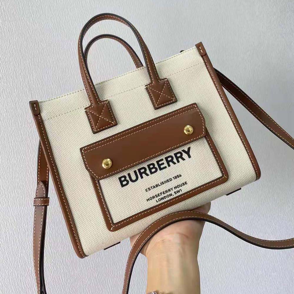 Close-up detail of gold hardware on Burberry Freya Bag-Brown