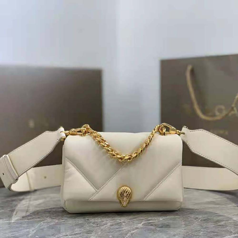 Close-up of gold-tone serpent clasp on Bvlgari crossbody bag