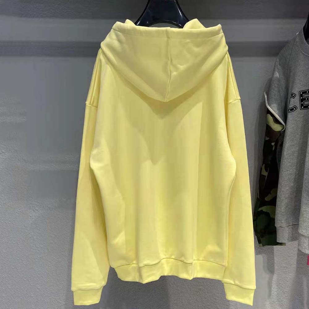 Side angle showing loose fit of Celine Women Loose Celine Sweatshirt