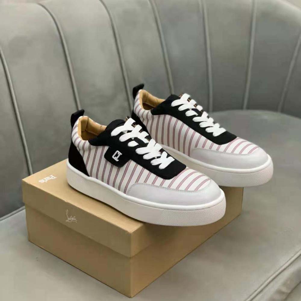 Top view showing lace-up closure on Christian Louboutin flat