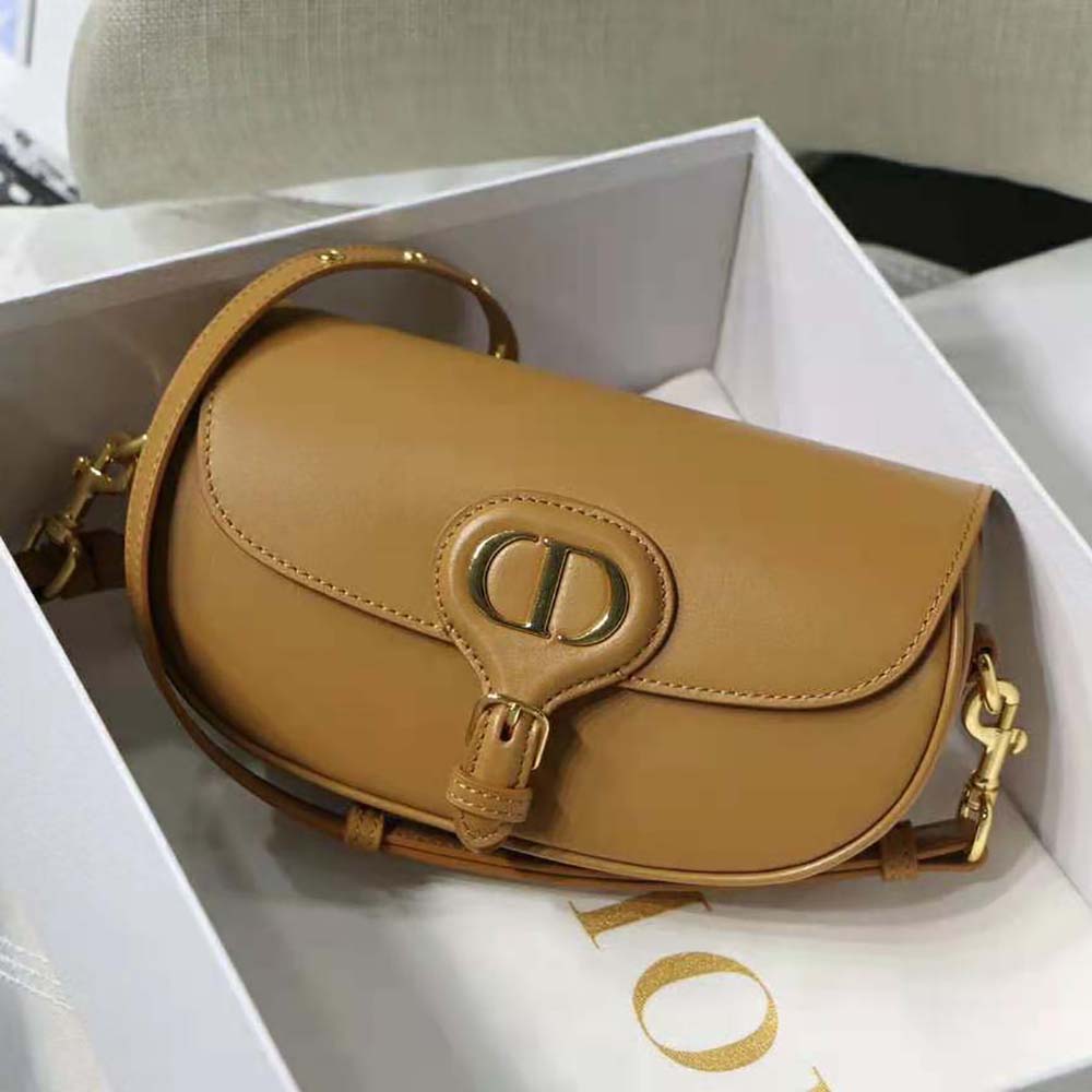 Close-up of gold-tone Dior CD clasp on Bobby East-West Bag