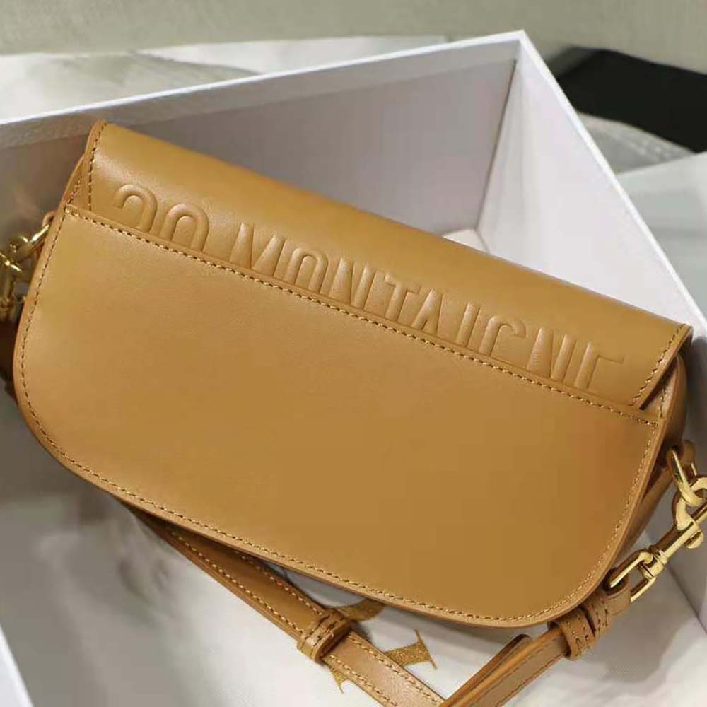 Side angle showing adjustable strap and structure of Dior Bobby Bag