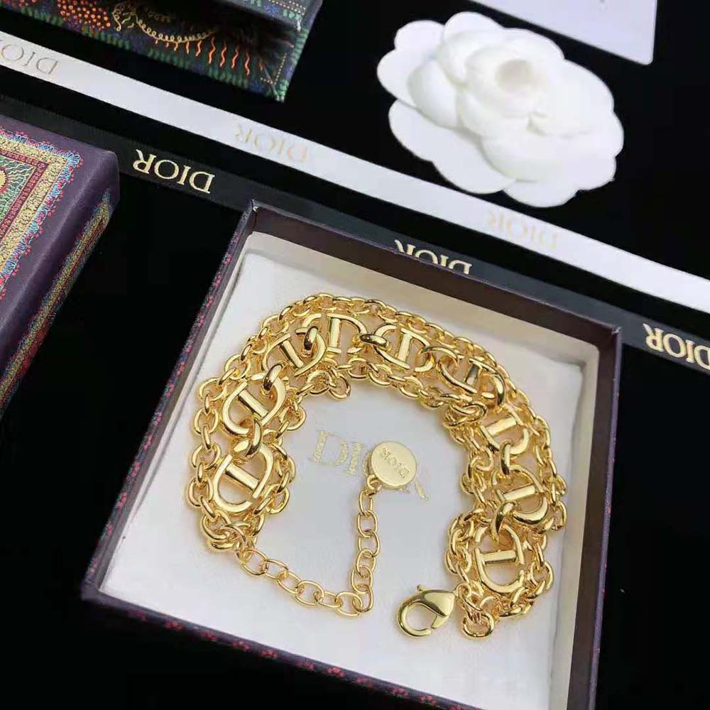Dior Women CD Navy Bracelet Gold-Finish Metal laid flat showing full silhouette