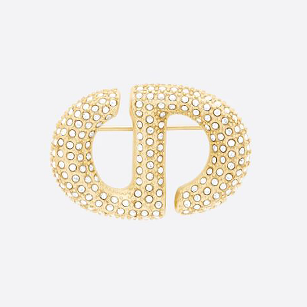 Close-up of Dior Women CD Navy Brooch gold-finish metal and crystals