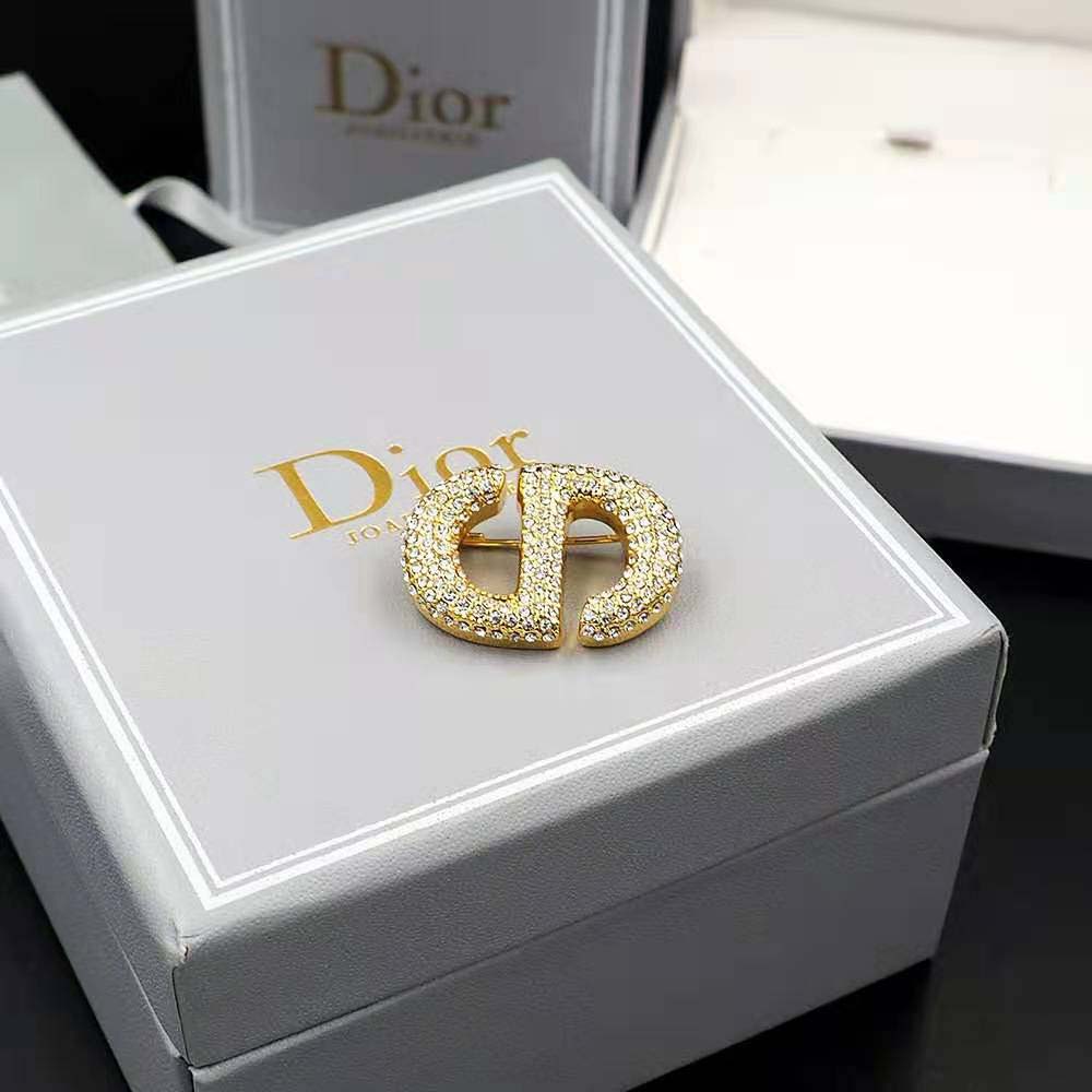 Dior Women CD Navy Brooch pinned on navy blazer lapel