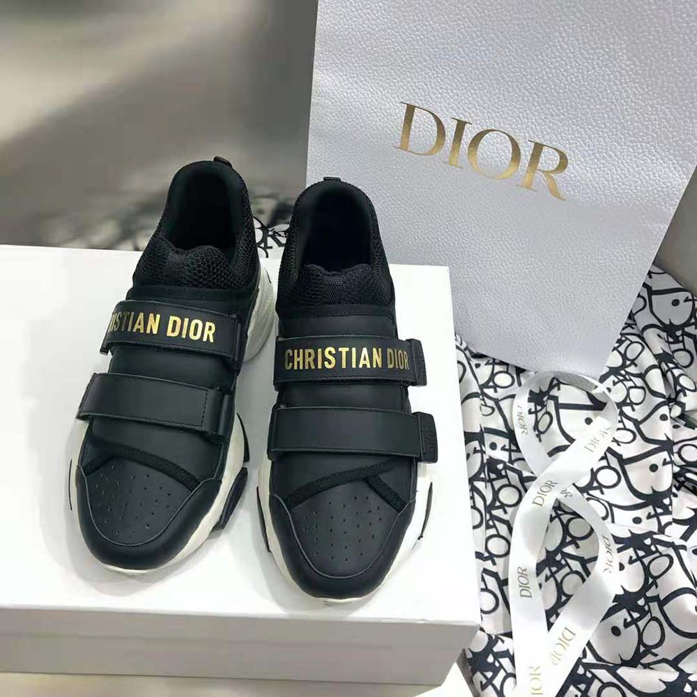 Close-up of black calfskin texture on Dior Women D-wander Sneaker