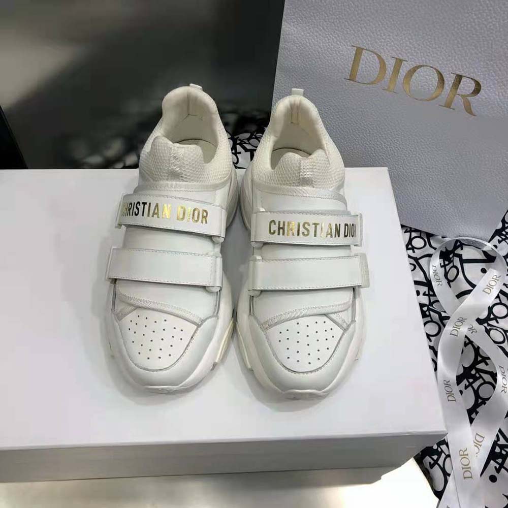 Close-up detail of white calfskin and Dior embossing on D-wander Sneaker