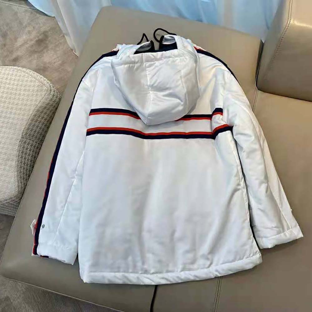 Side angle showing hood and zipper detail on Dioralps Hooded Anorak