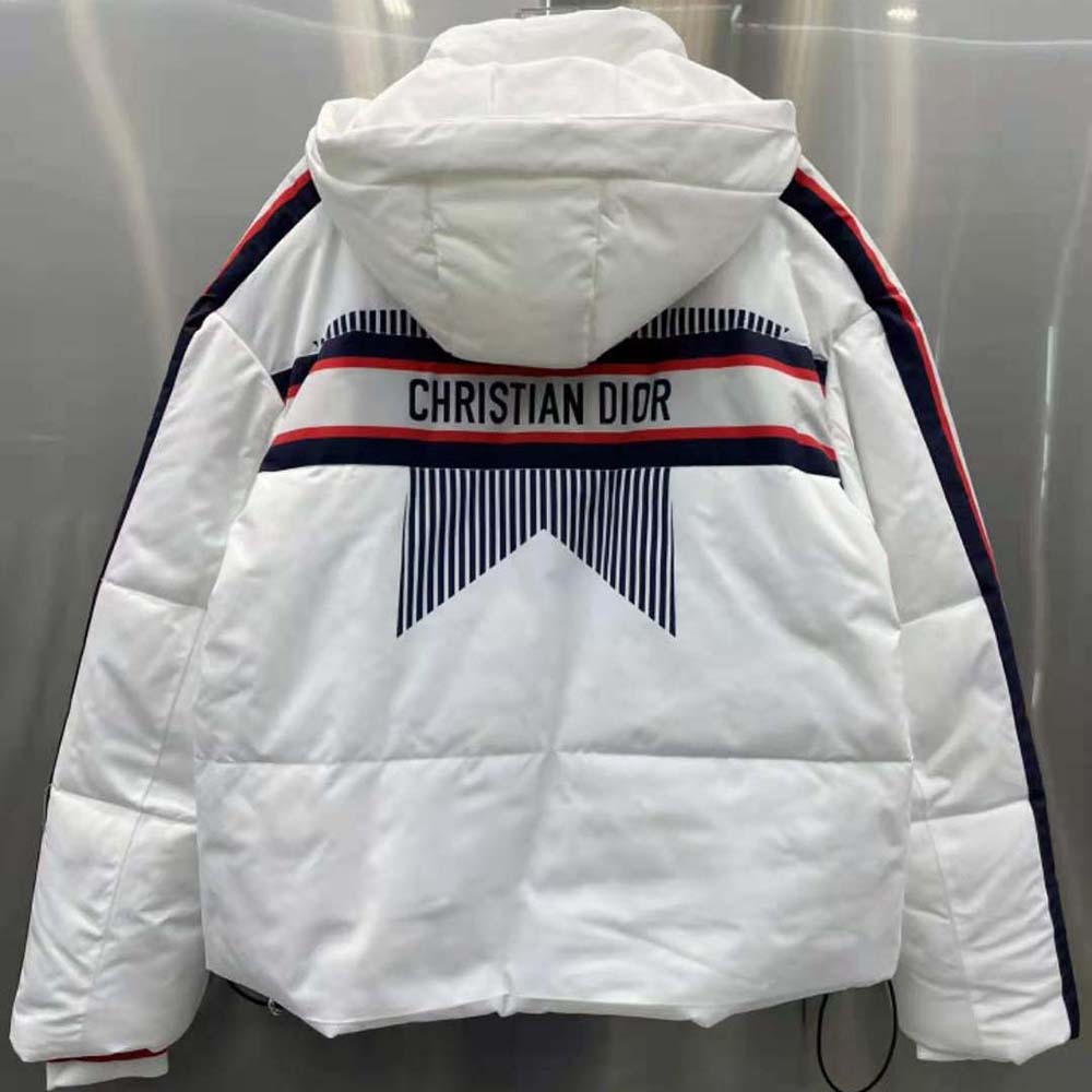 Close-up of silver-tone hardware on Dioralps white three-tone jacket