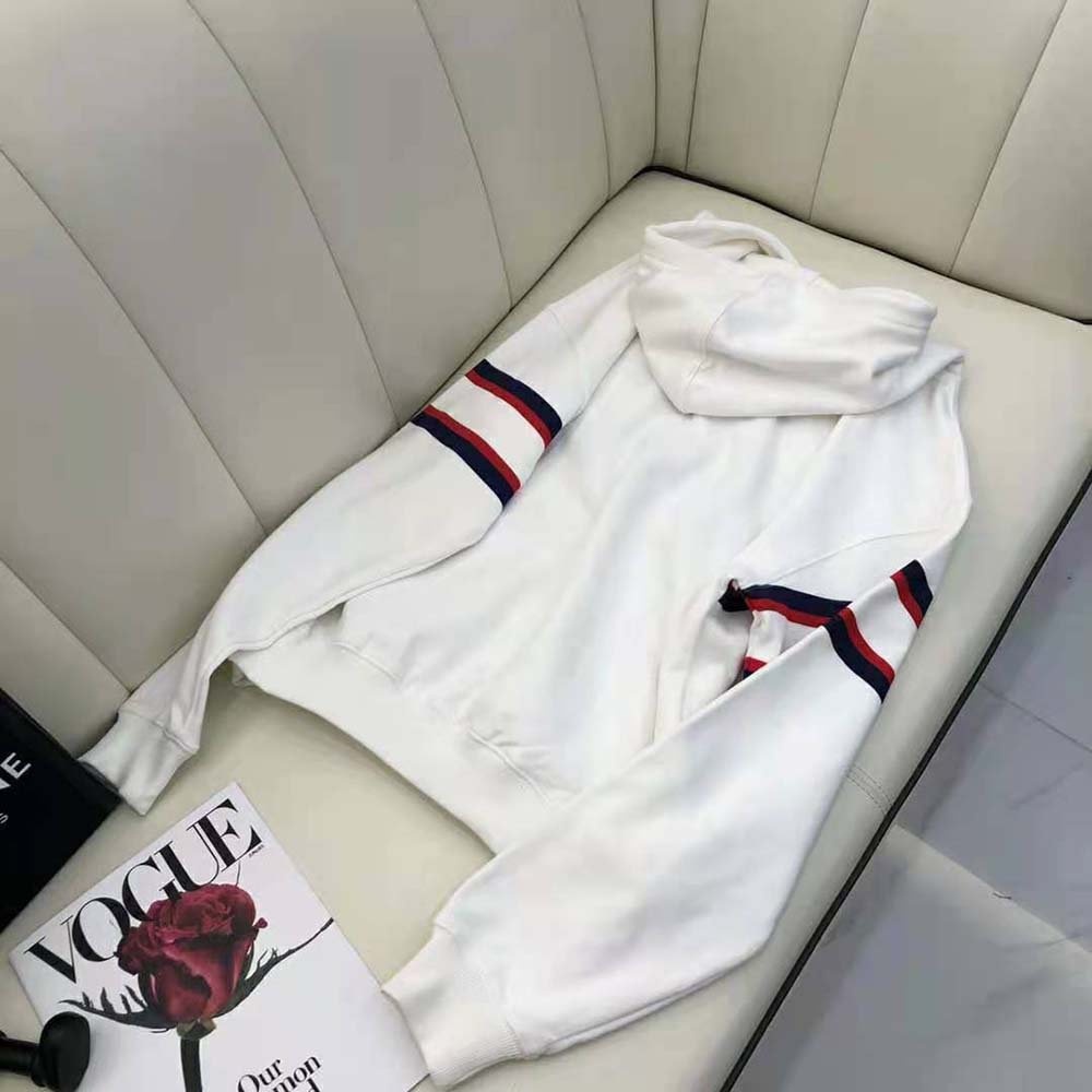 Side profile showing relaxed fit of Dioralps Hooded Sweatshirt by Dior