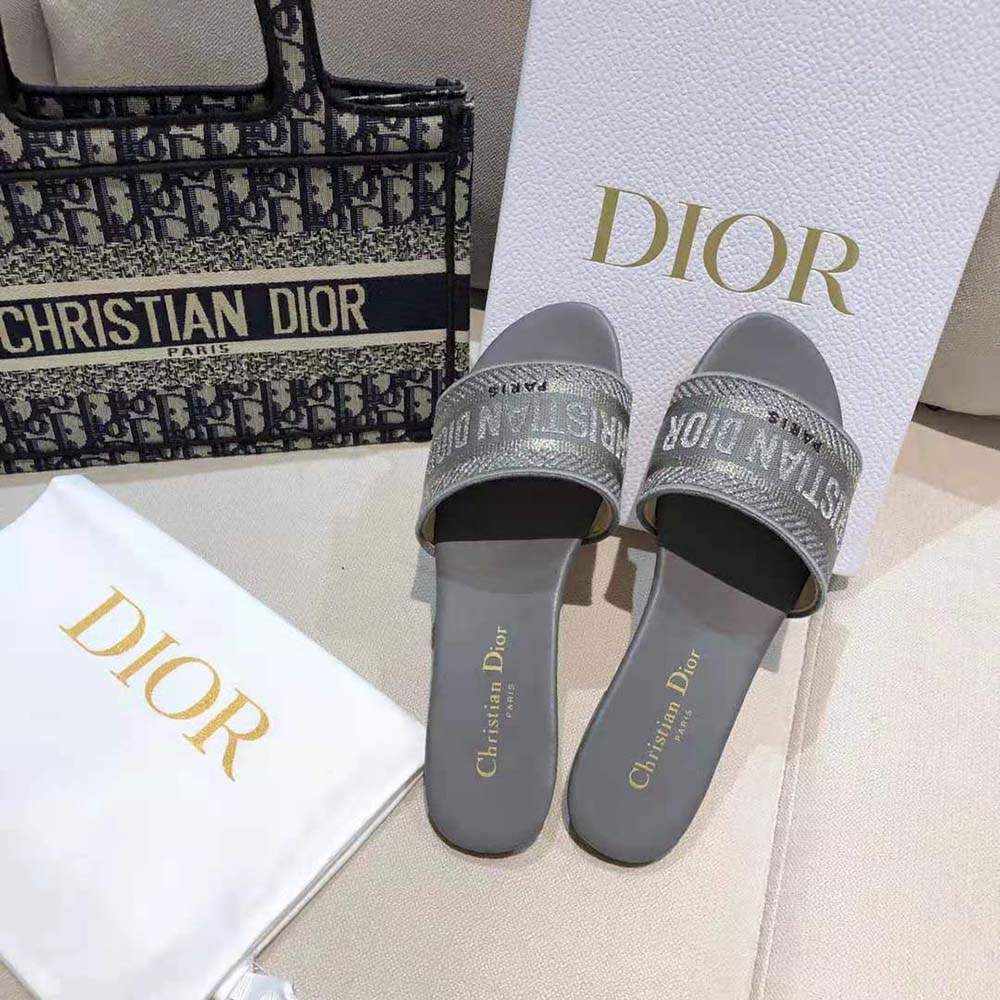 Close-up of embroidered metallic fabric on Dior Women Dway Slide