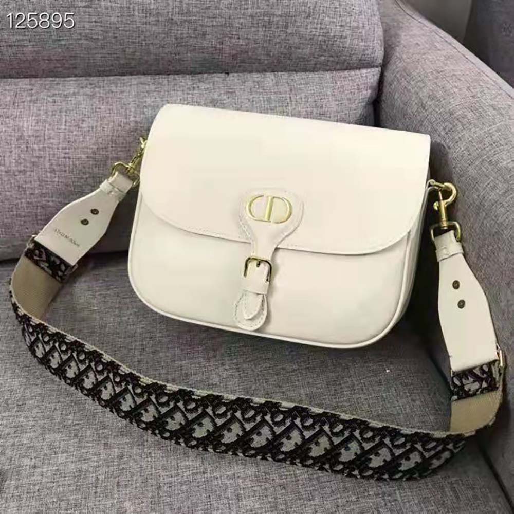 Side profile showing silhouette and shoulder strap of Dior Women Large Dior Bobby Bag Box Calfskin-White