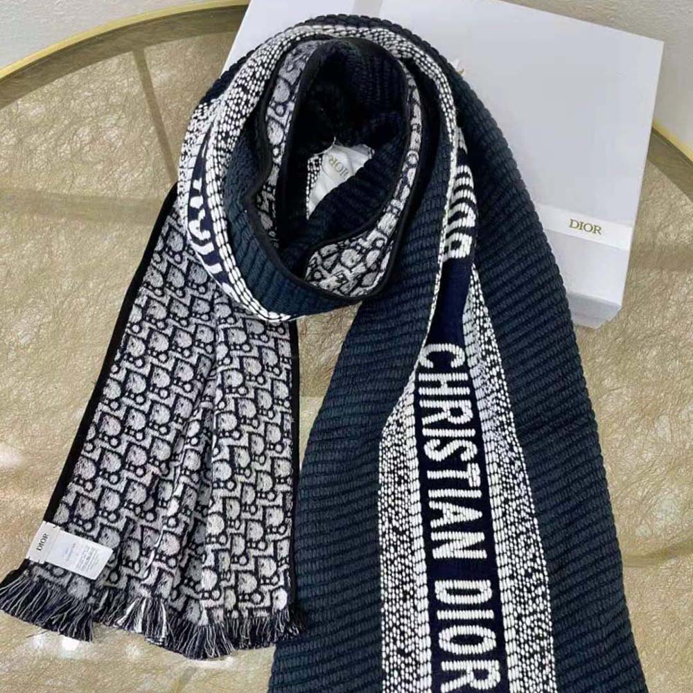 Side angle of Dior Women Oblique University Reversible Scarf highlighting fabric texture