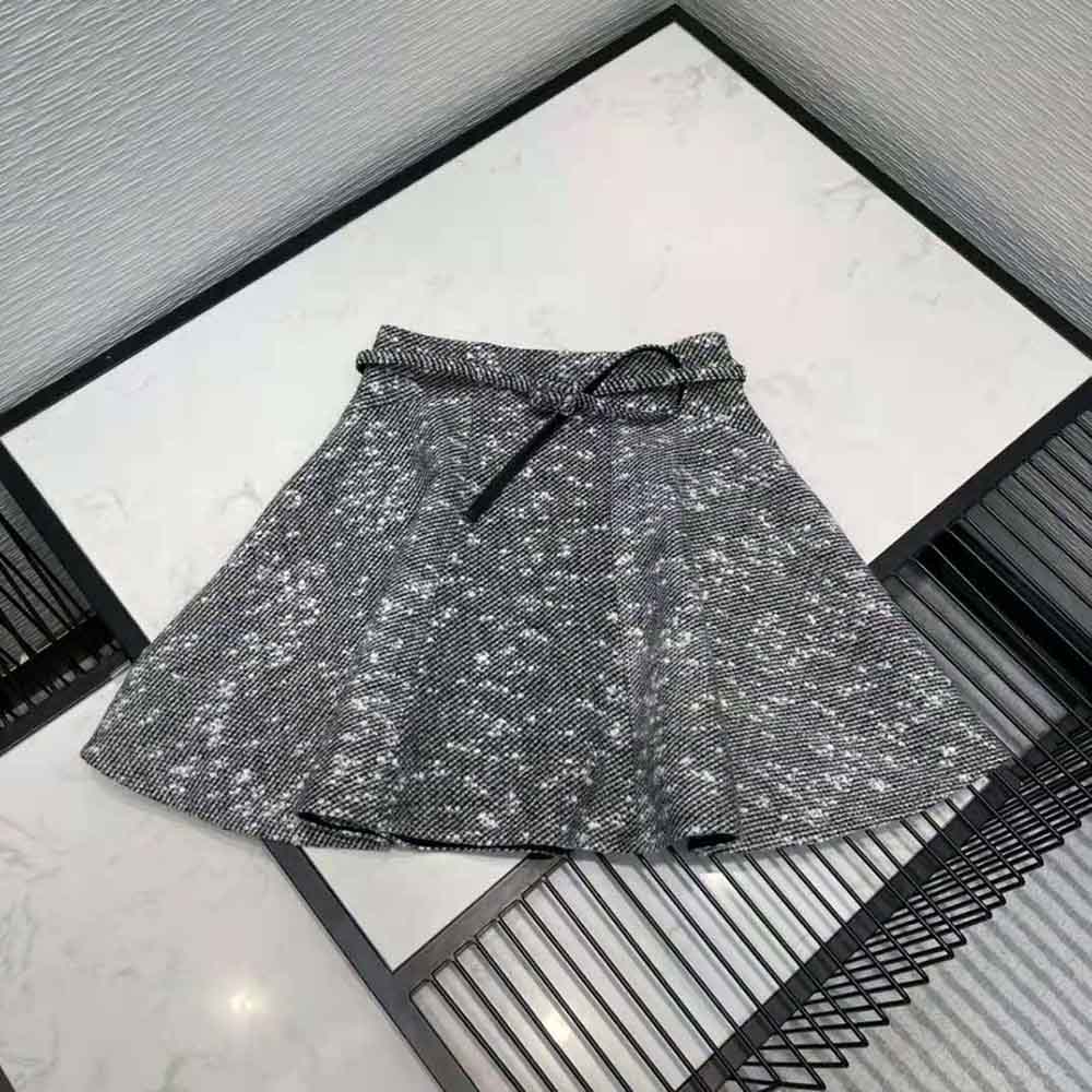 Close-up detail of fabric texture on Dior Women Short Skirt