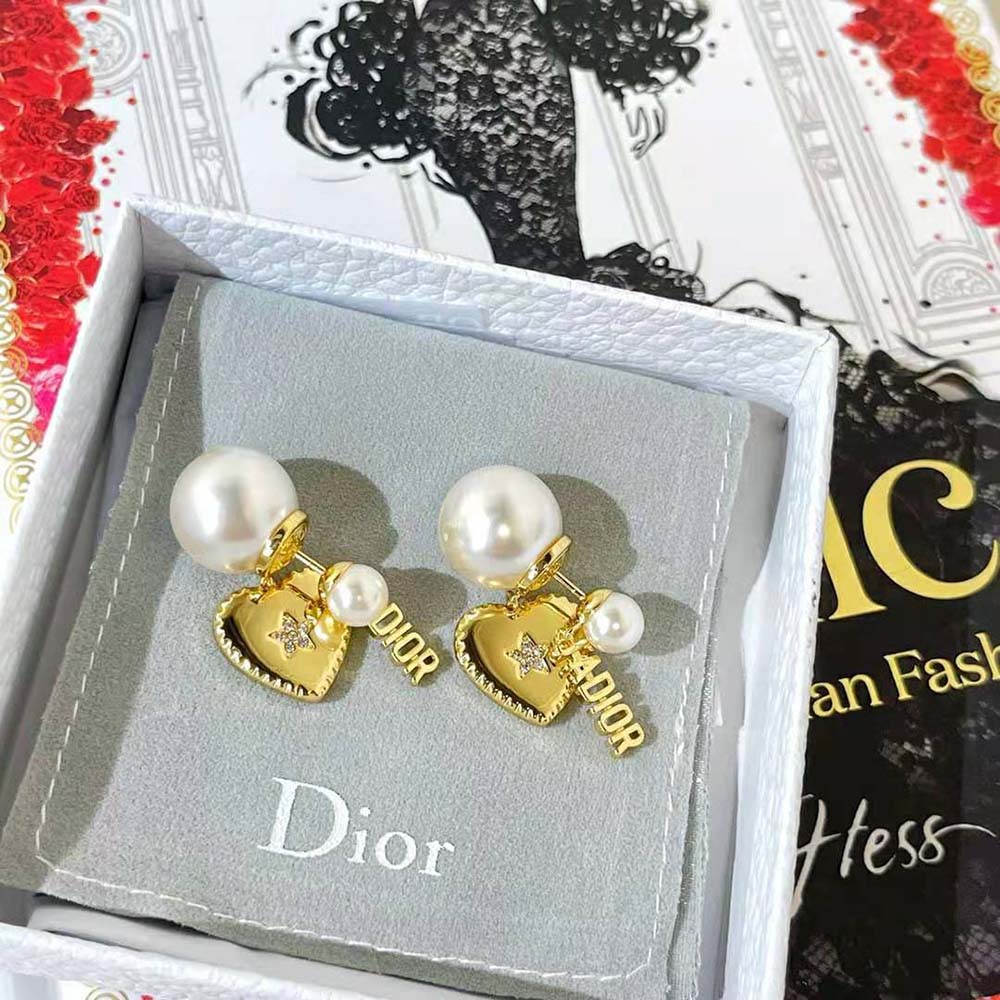 Side angle showing double-sided design of Dior Women Tribales Earrings