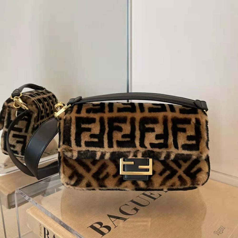 Close-up of gold-tone hardware on Fendi Women Baguette Brown Sheepskin Bag