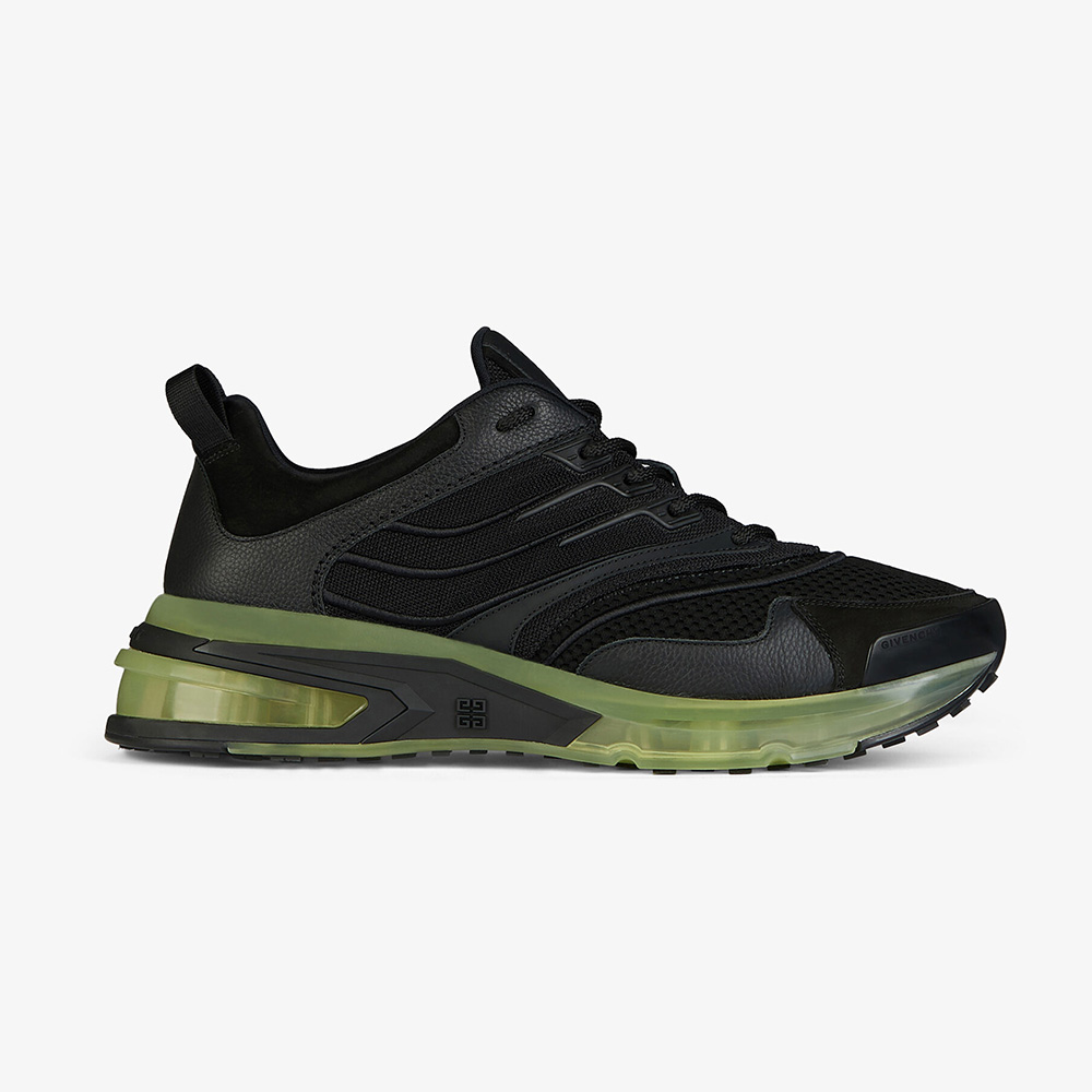 Side view of Givenchy Unisex Giv 1 Sneakers in Leather and Mesh-Black