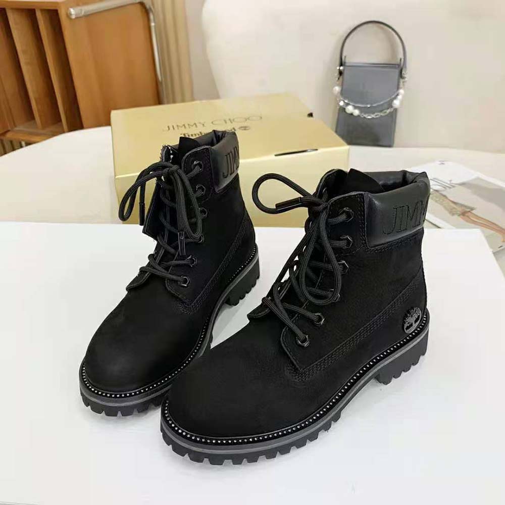 Close-up of gunmetal glitter hardware on Jimmy Choo Women JC X Timberland boots